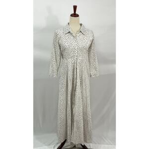 Brown and white spotted maxi shirt dress with a relaxed, flowing fit